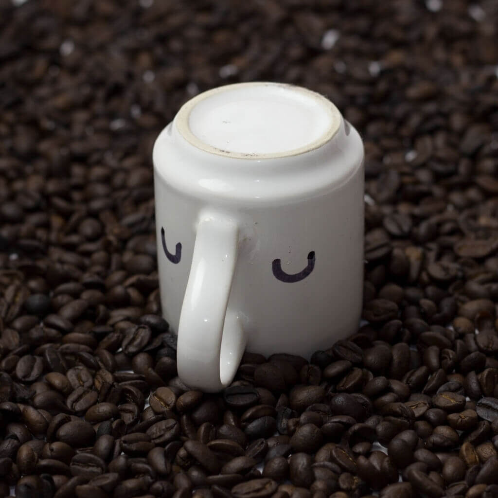 A coffee mug upside down 