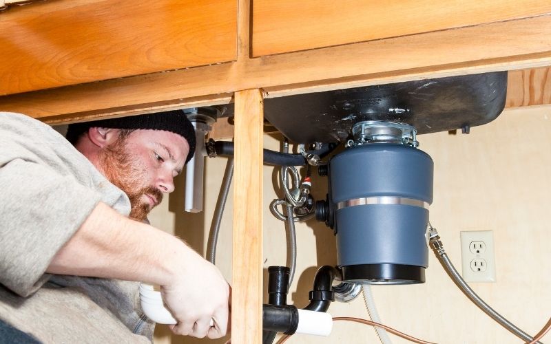 Spoon Stuck In Garbage Disposal Key Causes Fixes 