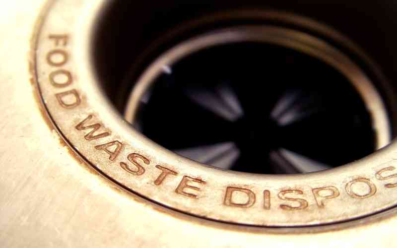 how to tighten garbage disposal blades