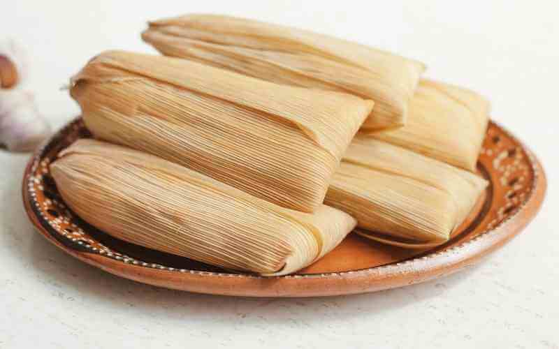 a plate of mexican tamales