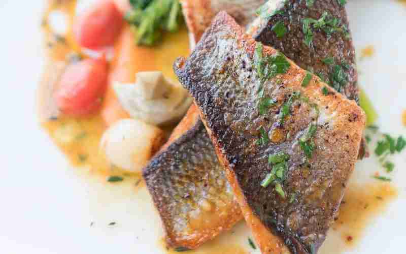 branzino with tomatoes and olives