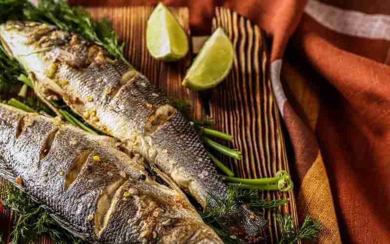 grilled branzino fish with lime and herbs